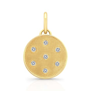14k gold diamond circle charm with bezel-set stones
