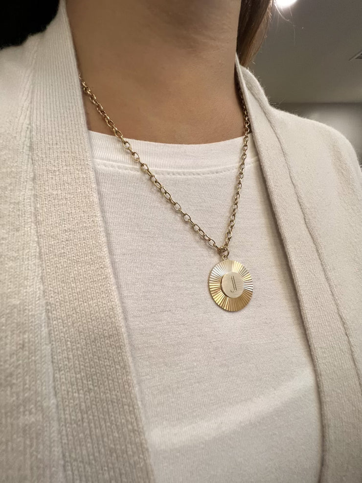 Handcrafted 14k gold personalized engraved necklace pictured on neck with chain